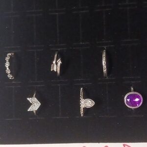 Size 4 Rings. Lot of 8 Rings! NWT. Silver, gold, emerald, and amethyst colors.
